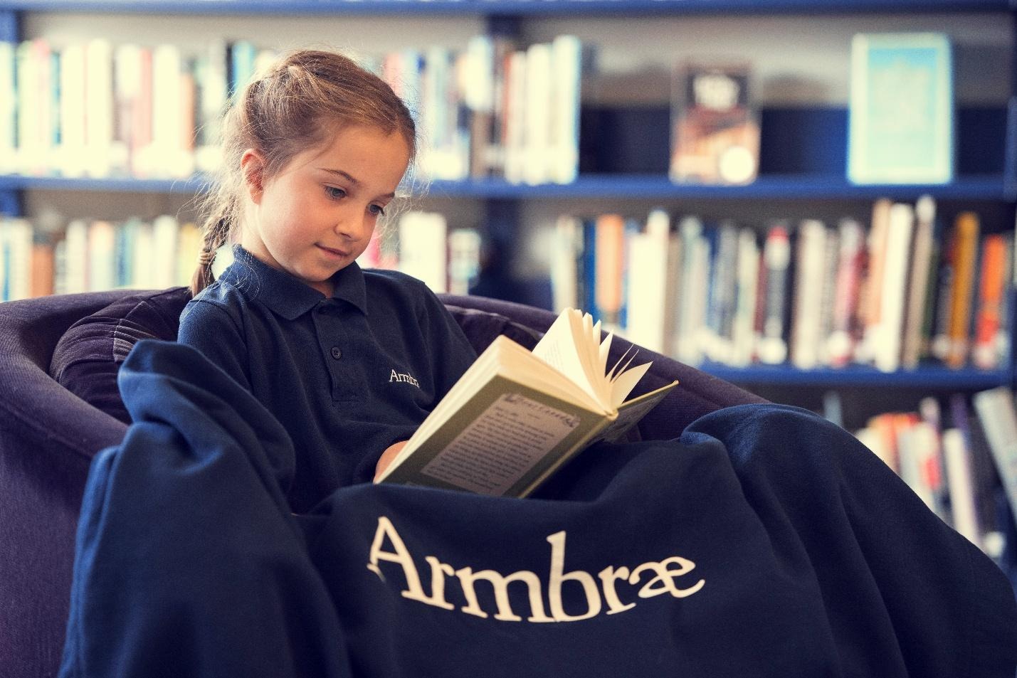 A child reading a book
AI-generated content may be incorrect.